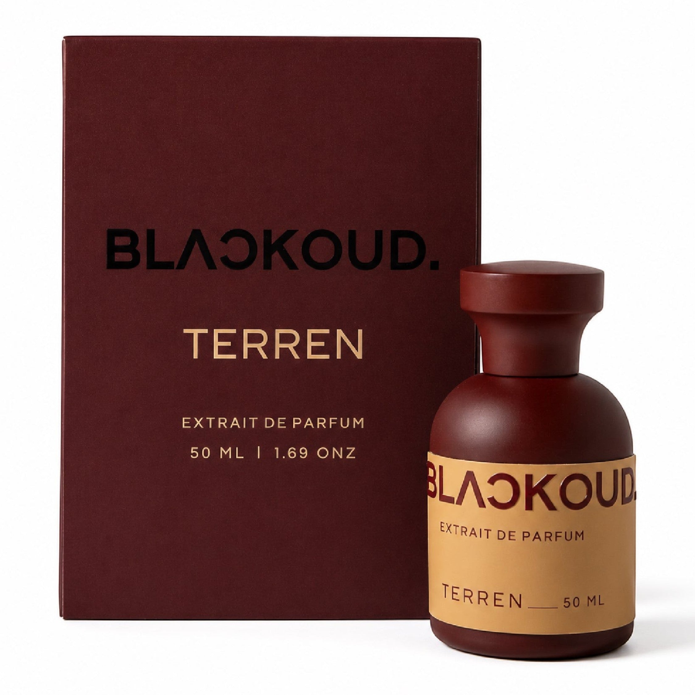 Unique Clothes Blackoud Terren extrait de parfum bottle and dark red box with elegant woody and spicy fragrance notes